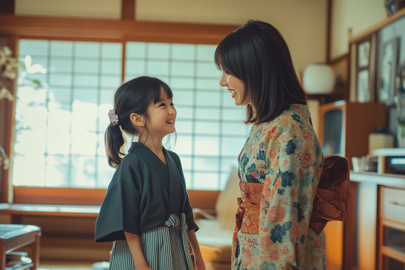 Mother and daughter sharing a cozy family moment.