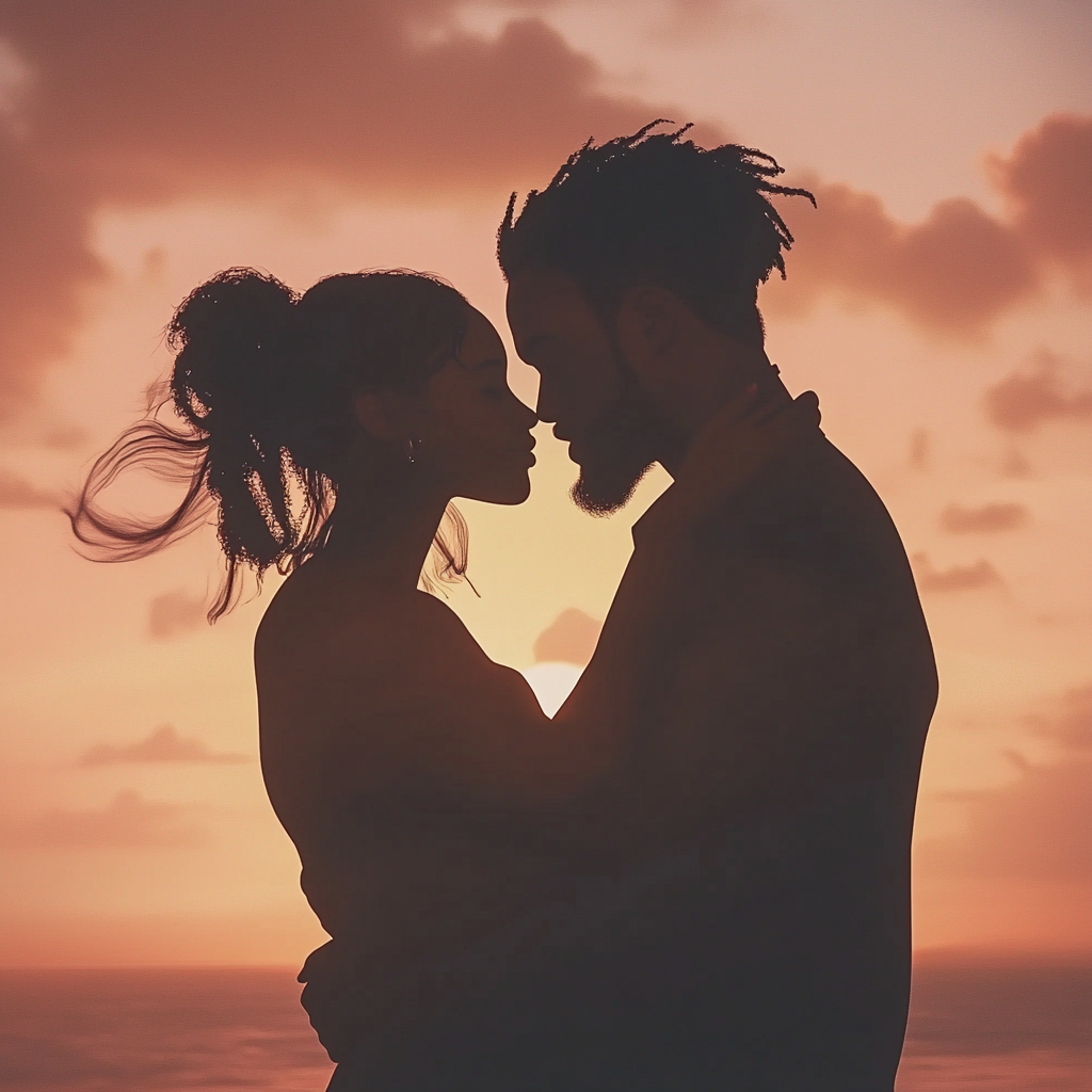 Silhouetted Couple Kissing on Beautiful Sunset Beach.