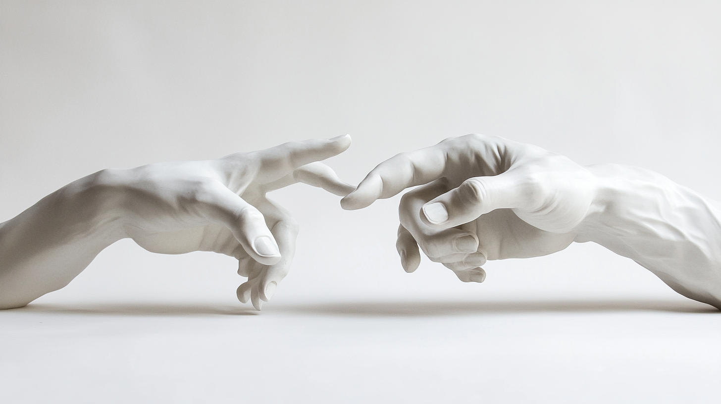 Two Ceramic Hands Trying to Touch