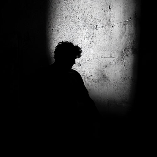 A Dark Shadow of a Man Yelling Frustratedly