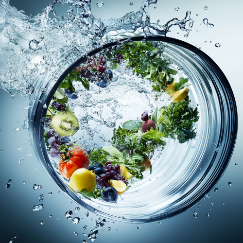A picture of a water vortex with fruit