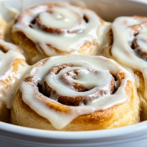 Delicious cinnamon rolls covered in creamy vanilla icing