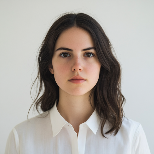 Frontal shot of young woman with dark hair.