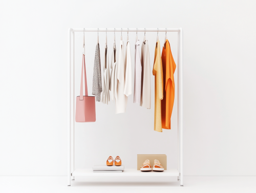 Minimalist clothing display with mix of styles and colors. Minimalist clothing display with mix of styles and colors.