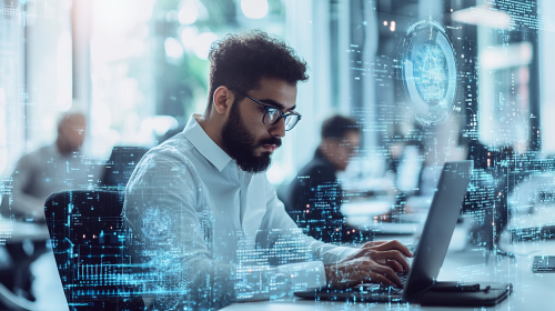 People Working on Laptops in High-Tech Office