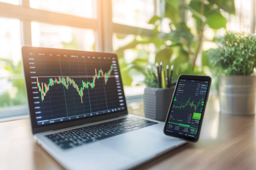 Professional Investment Scene with Financial Charts and Apps