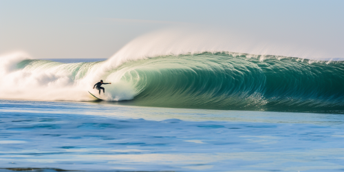 Surfers riding waves on a beautiful beach