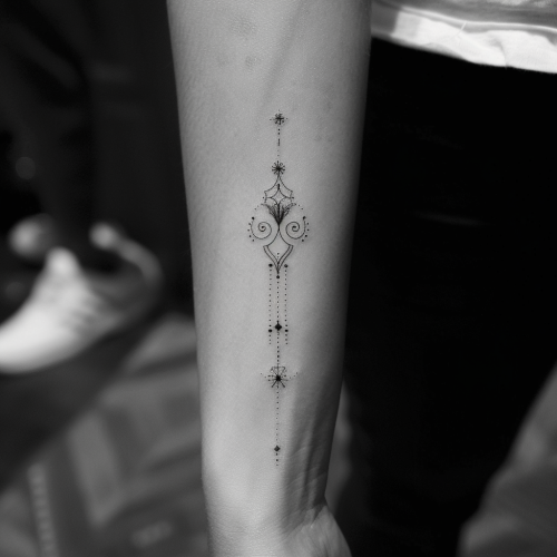 Minimalist black handpoke tattoo design