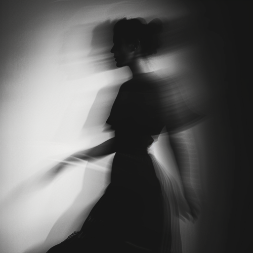 Blurry silhouette of woman in black and white