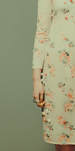 Woman holding a floral decoupage box