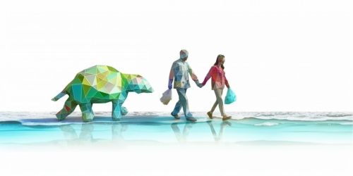 Happy family walking on beach holding hands