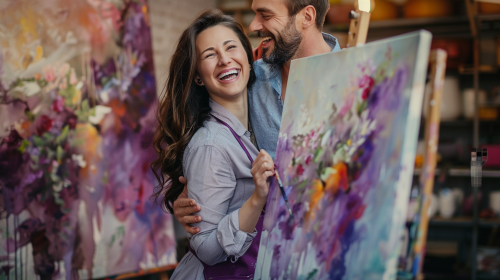 Woman painting with husband hug Woman painting with husband hug