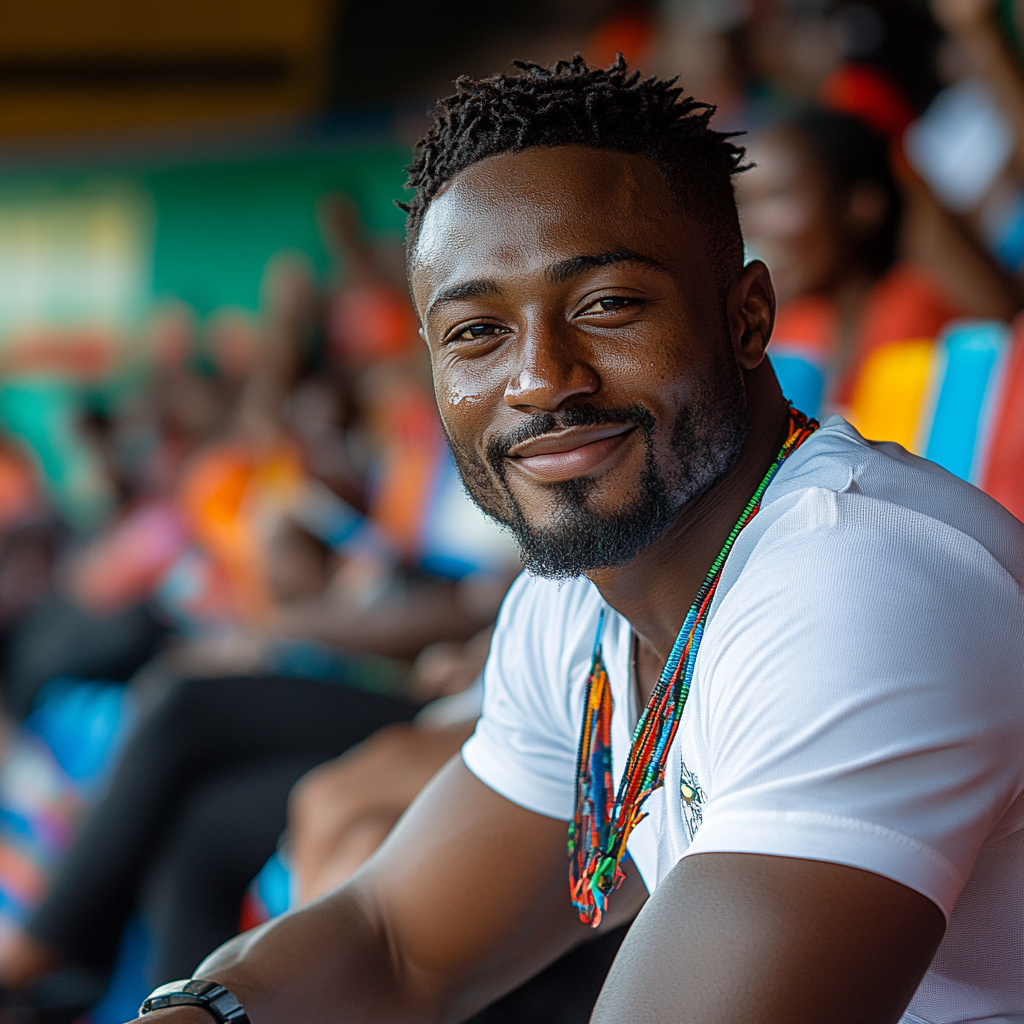 A Happy Tanzanian Man at the Stadium