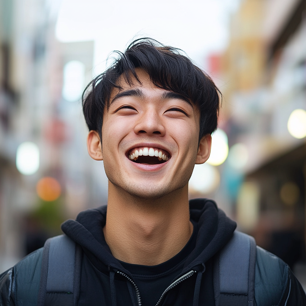 Excited Japanese university student in Nagasaki urban setting.