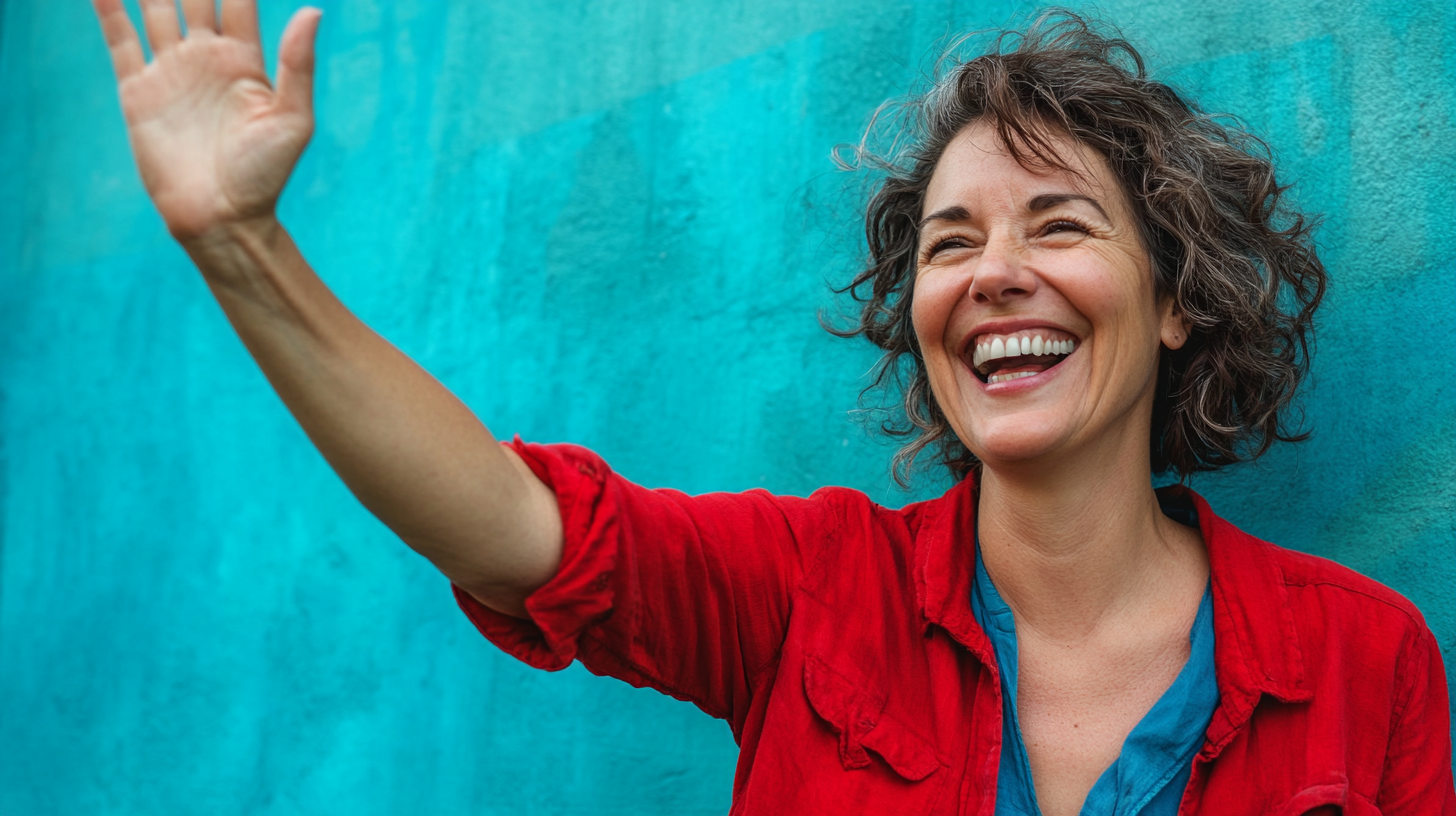 Middle-aged lesbian celebrating win, smiling widely, playful attitude.