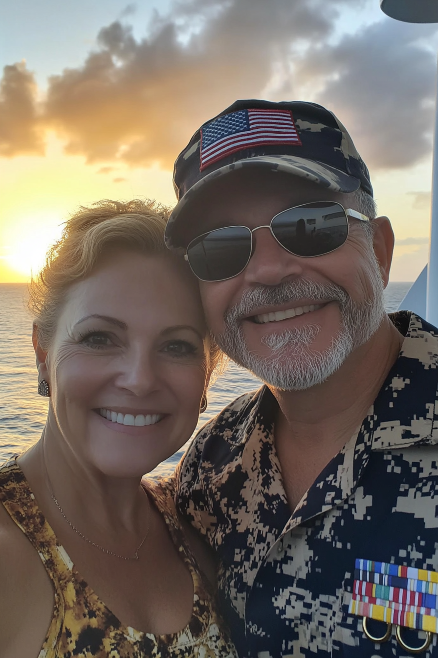 Smiling couple on cruise ship at sunset.