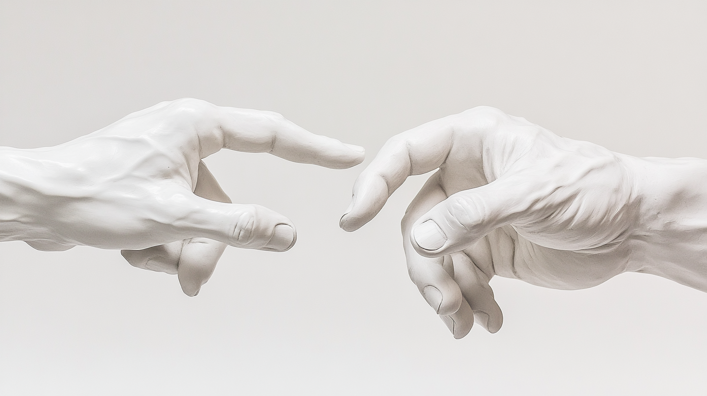 Two Ceramic Hands Trying to Touch