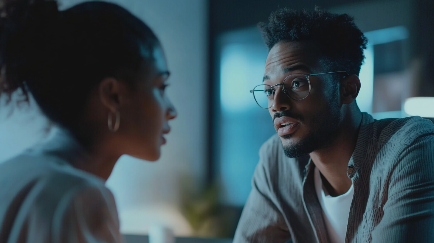 Two executives having professional conversation in stylish office