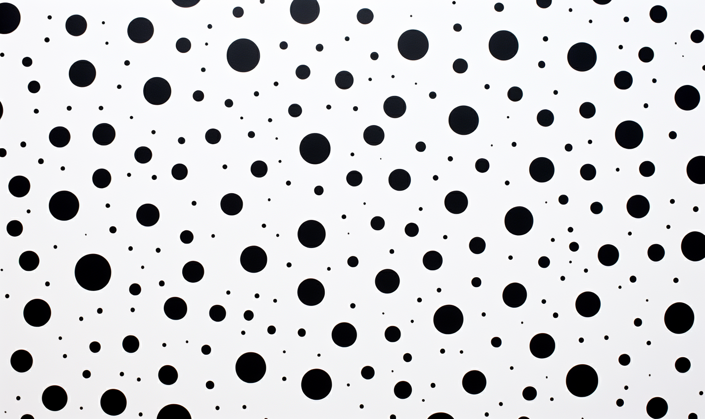 Abstract black dot pattern on white surface