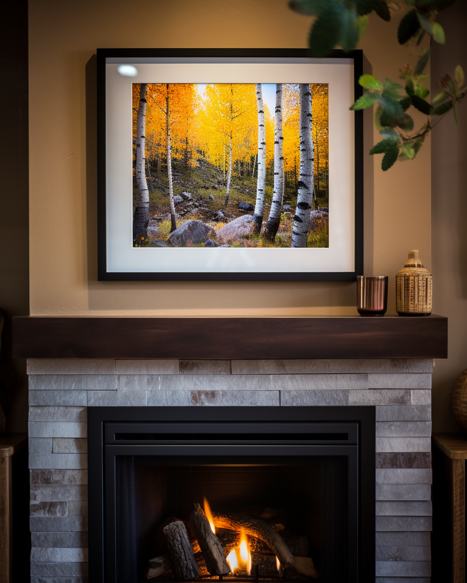 A landscape picture hanging on a wall in a cozy cabin