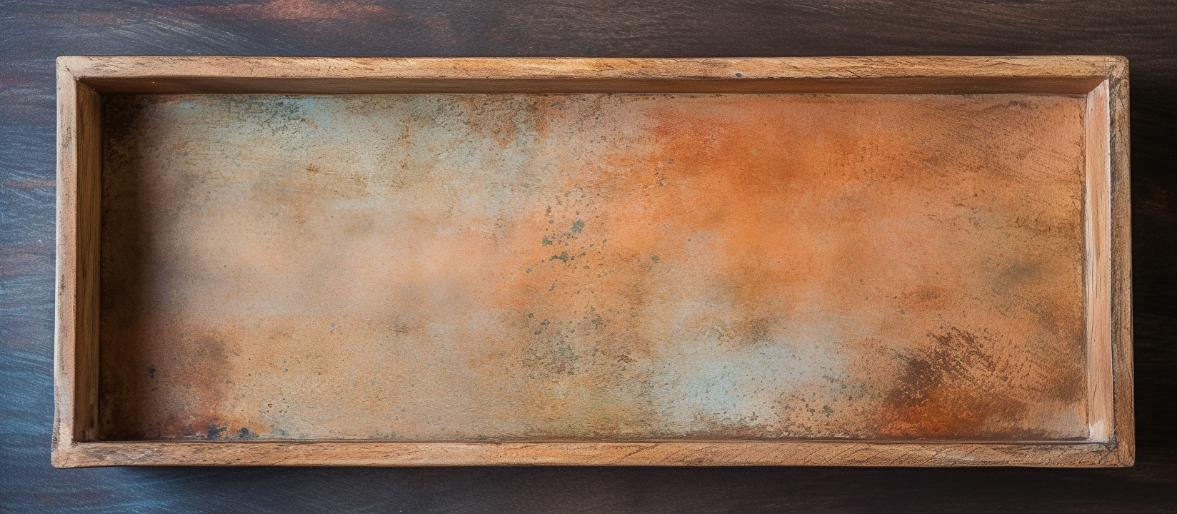 Top view of dust-covered clay tray