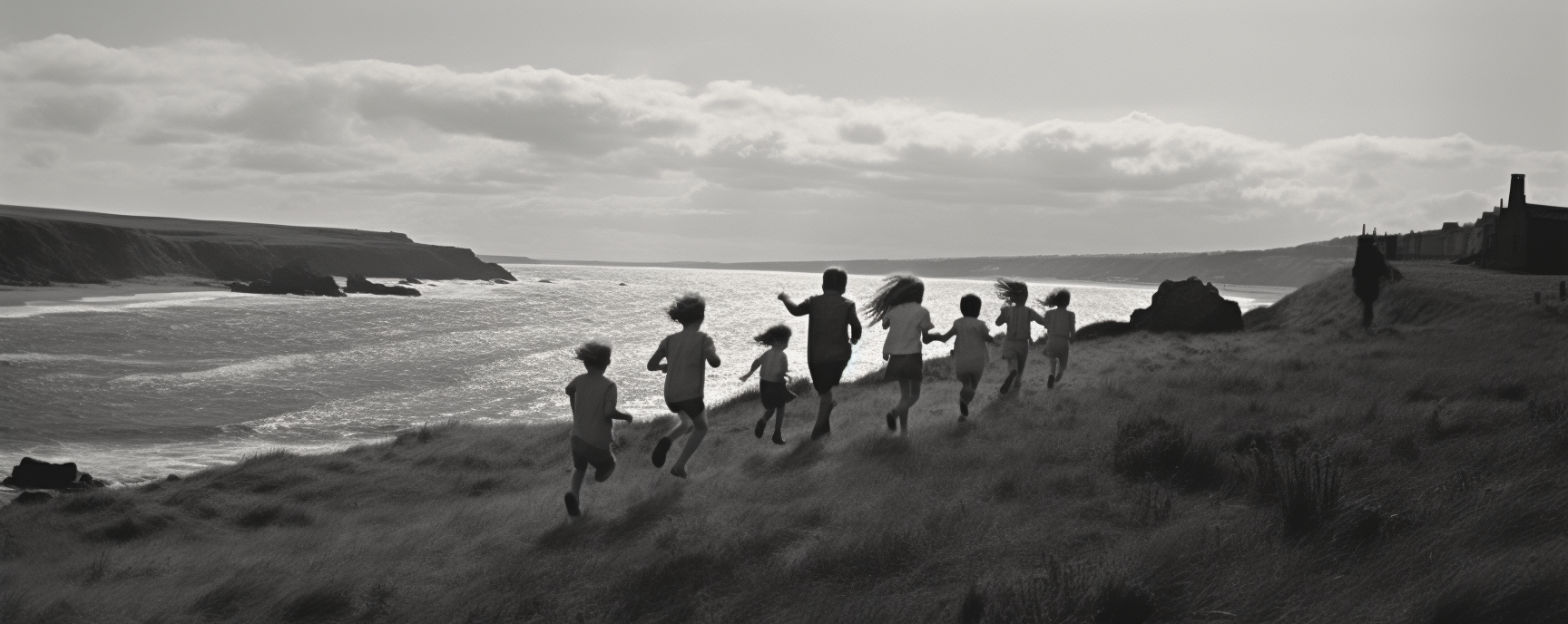 Group of Children Running Up Hill on Beach