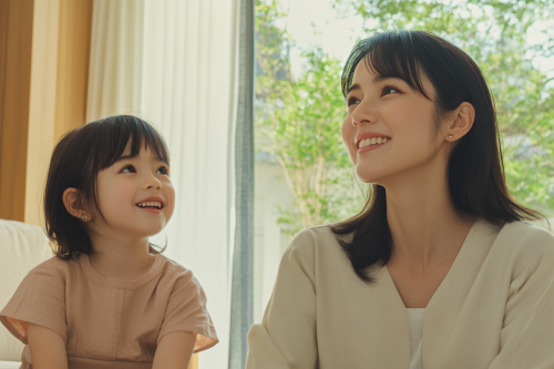 A Japanese mother and daughter bonding in modern room.