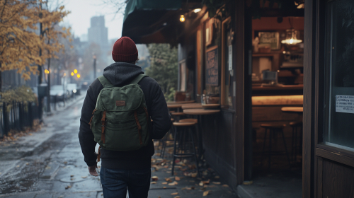A Man Exiting a Rustic American Café