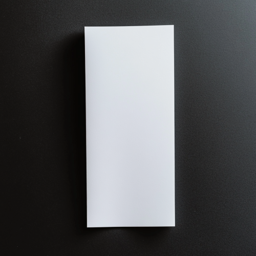 A Simple, Stark Contrast of White Brochure on Black