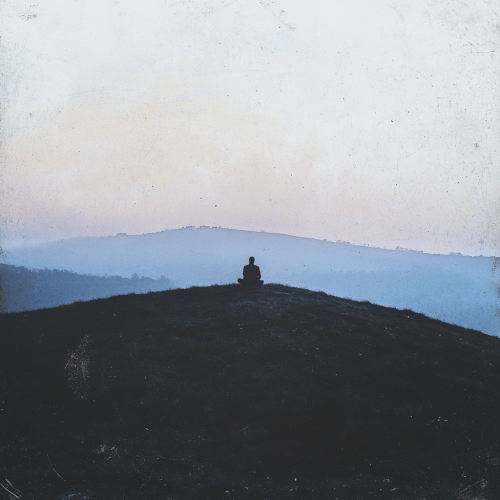 Album cover shows figure alone in peaceful landscape. Album cover shows figure alone in peaceful landscape.