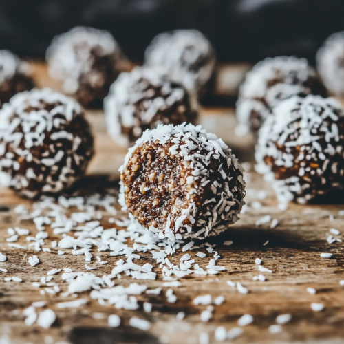 Delicious energy balls with dates, nuts, cacao and coconut
