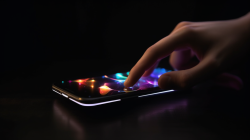 Hand picking up phone on dark background for PowerPoint