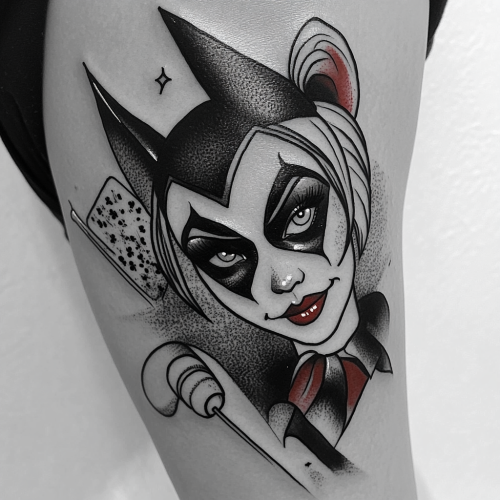 Harley Quinn tattoo design with playful expression and detailed shading.