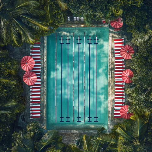 Iconic Olympic Swimming Pool in Amazon Jungle, Aerial Shot