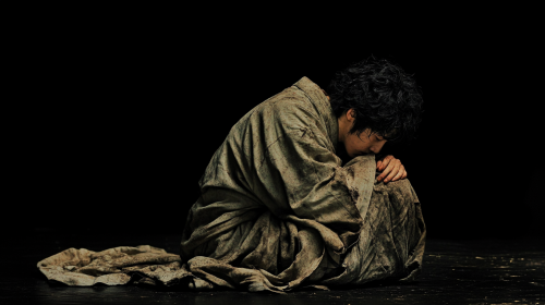 Japanese man resting in traditional clothes, Henri style