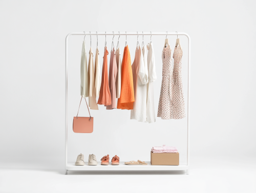 Minimalist clothing display with mix of styles and colors. Minimalist clothing display with mix of styles and colors.