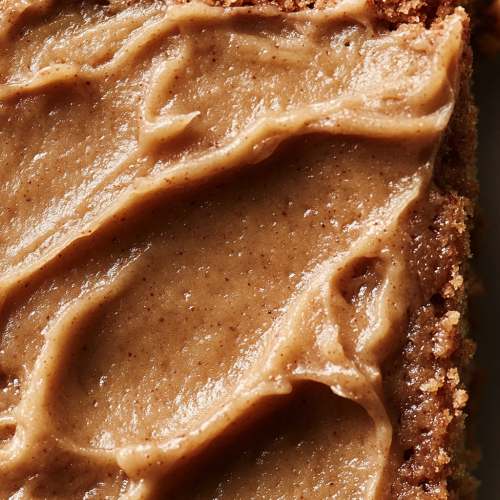 Moist Applesauce Cake Slice with Creamy Frosting