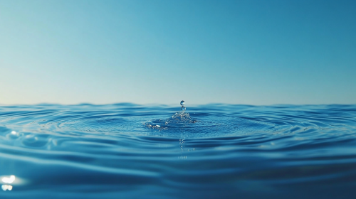 Peaceful Water Ripples on Blue Sky Wallpaper