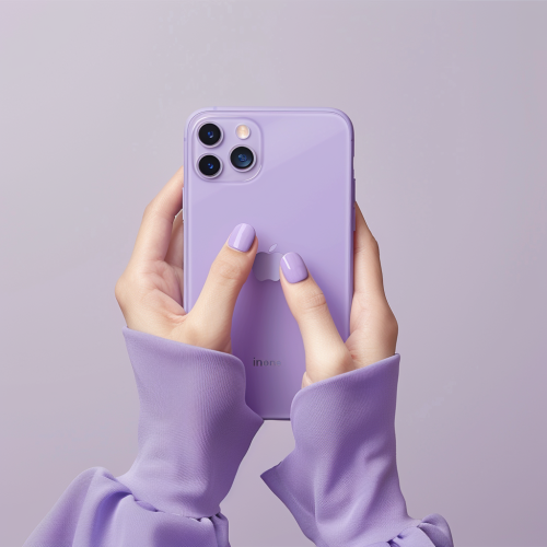 Purple iPhone held by hands in texting position