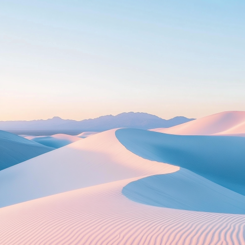 Sunset over sand dunes with lone shadow
