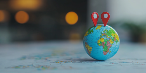 The Globe and Map Marked with GPS Pins The Globe and Map Marked with GPS Pins