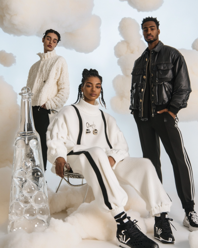 Three People Pose for Vogue Photoshoot in Chic Outfits