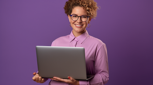 Professional web developer smiling with Macbook Air