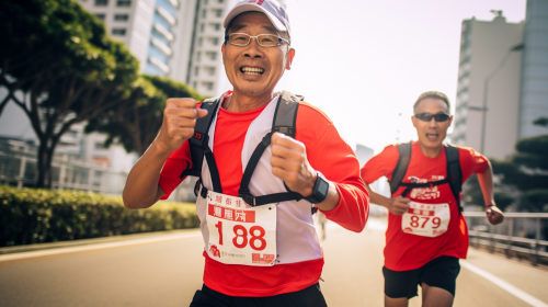 Asian man running marathon with name tag 52