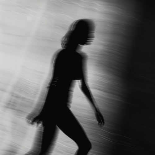 Blurry silhouette of woman in black and white