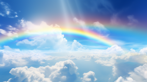 Vibrant rainbow in bright blue sky Vibrant rainbow in bright blue sky