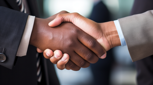Diverse professionals shaking hands for growth opportunities
