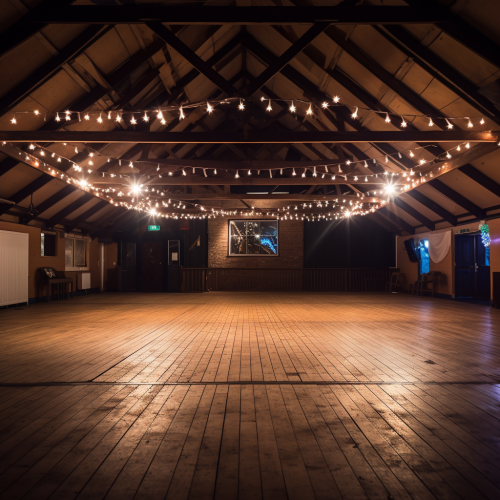 Empty community hall with festoon lights