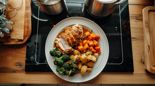 Empty kitchen worktop with overflowing roast dinner plate Empty kitchen worktop with overflowing roast dinner plate