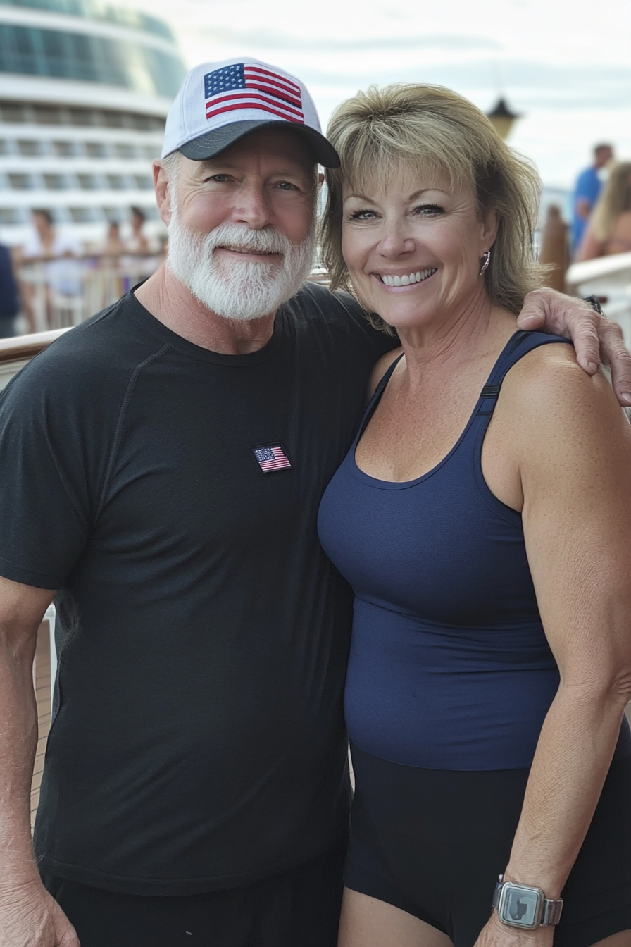 Beautiful 55-year-old couple on cruise ship deck